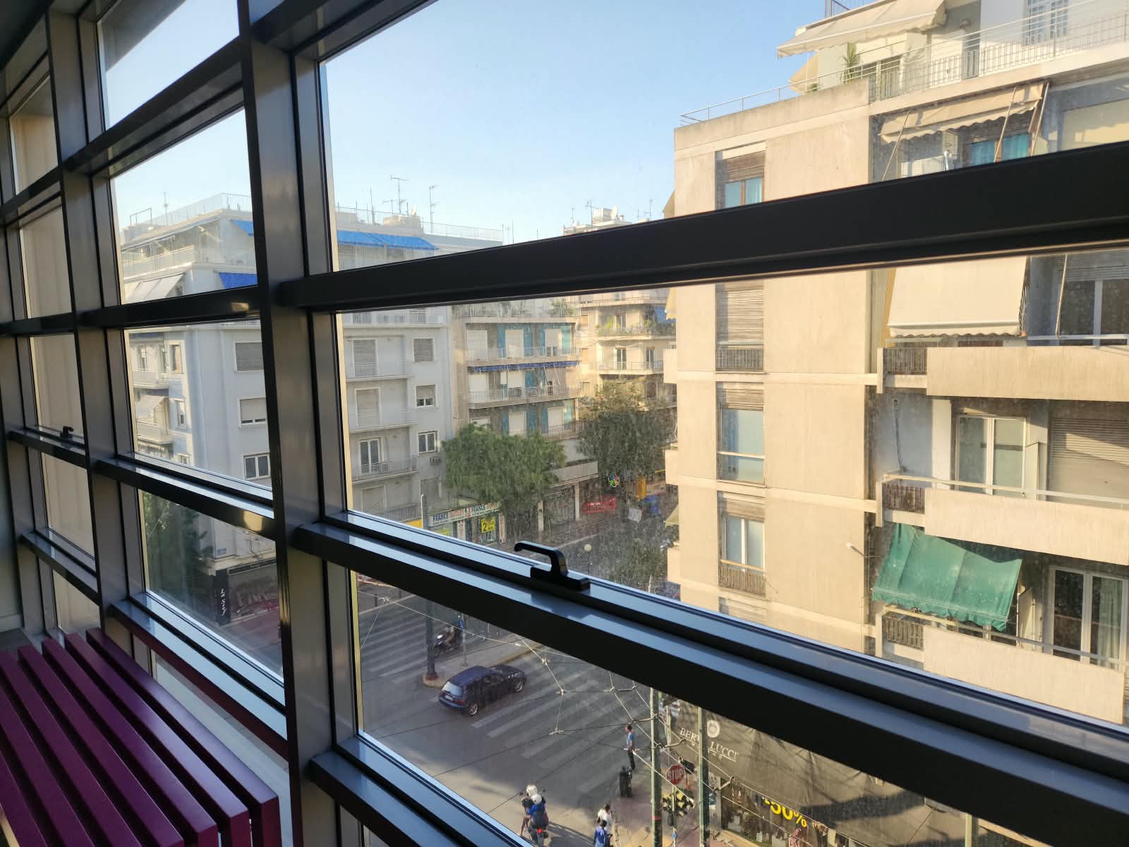 The street below, seen from an upper floor of the building.
